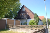 Ostansicht, mit Balkon im D... - Einfamilienhaus in Ihrlerstein in schöner ruhiger Wohnlage mit 2 Garagen und großzügigem Garten